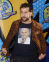 Joey displays his tee-shirt of Pope John Paul as he arrives for the 2003 MTV Movie Awards at the Shrine Auditorium in Los Angeles, CA. (May 31, 2003)