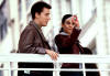 Lance & Emmanuelle Chriqui on the set of "On The Line". (2001)